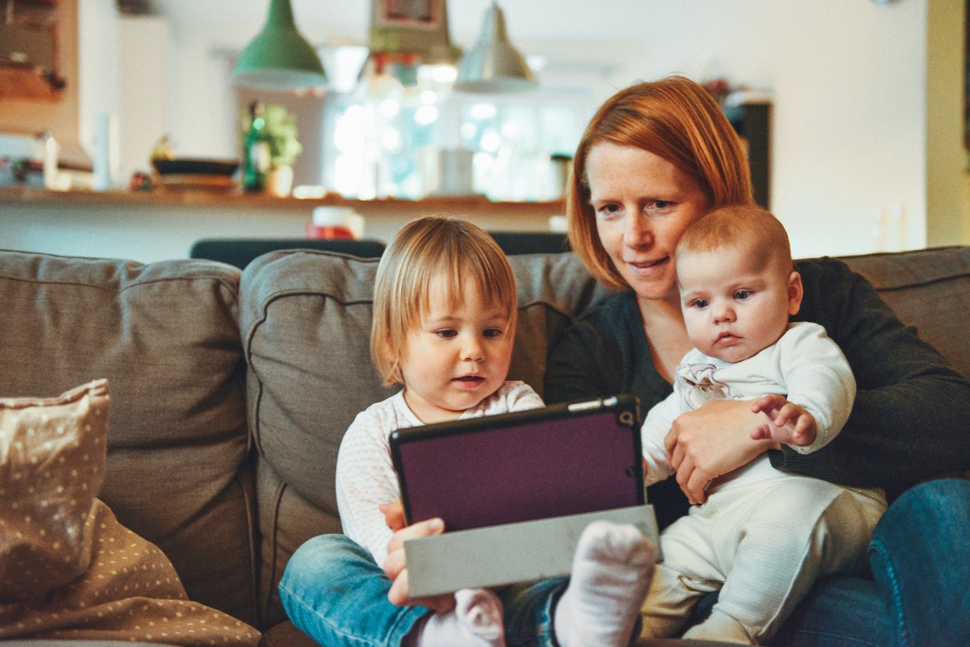 Parent using a smartphone to search for a local occupational therapist near home